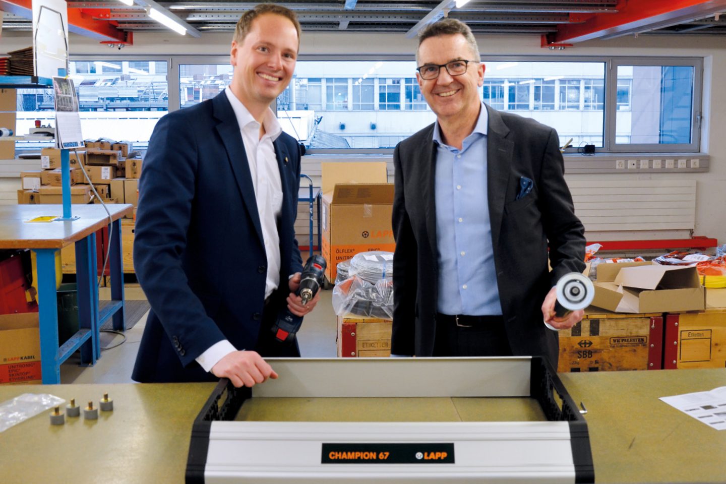 On the picture you can see Matthias Lapp, CEO U.I. Lapp GmbH (left) and Reto Volland, Managing Director Volland AG (right) in front of the LAPP Champion