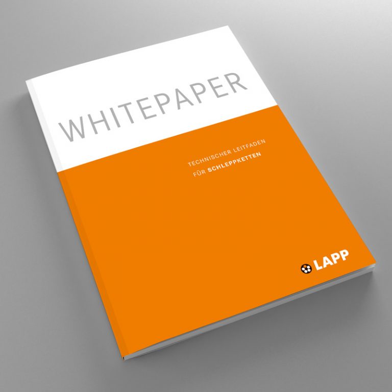 Eine Broschüre wird gezeigt: Technischen Leitfaden für Schleppketten von LAPP