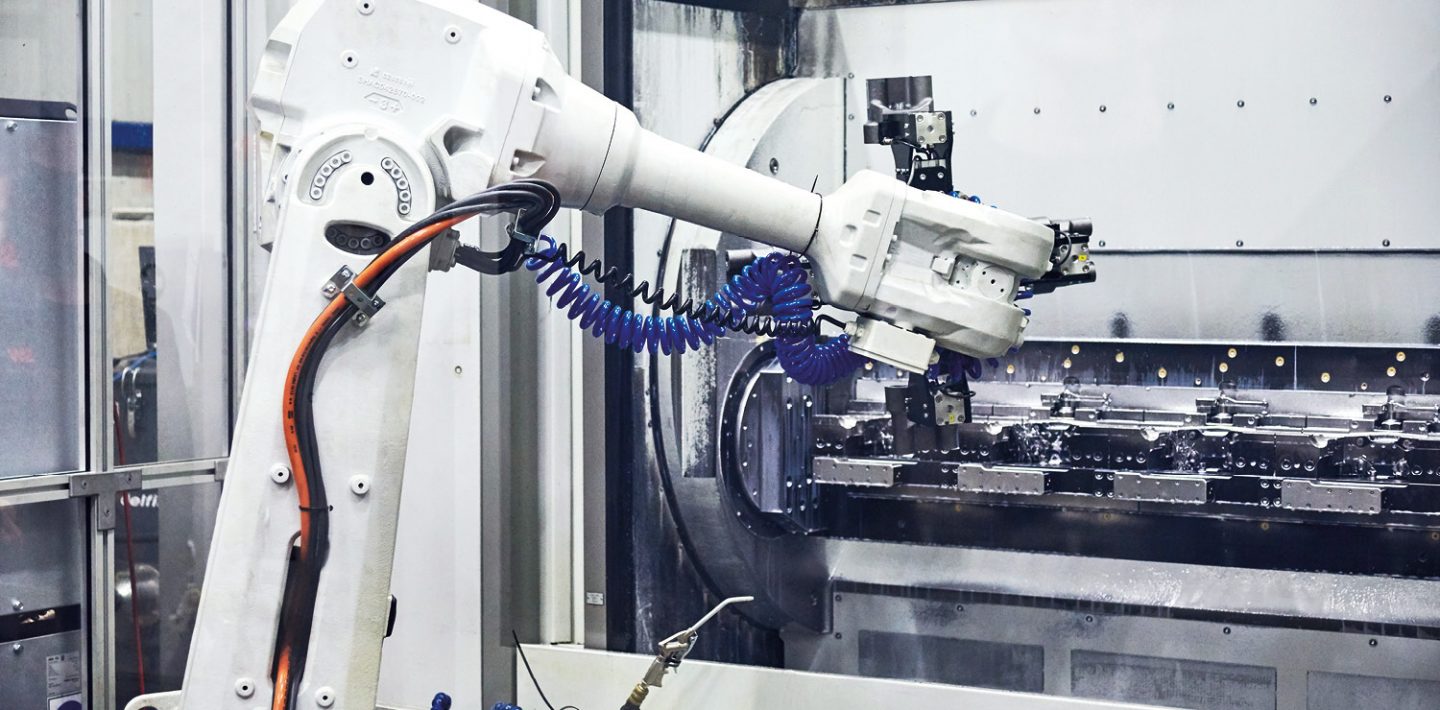 The picture shows a robot with cables from VIVA Forging Company.