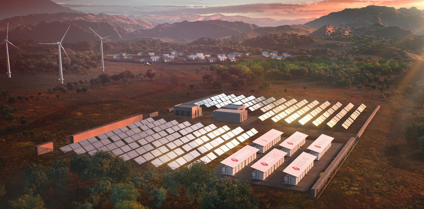 The picture shows a solar park with Azelio modules for storing thermal energy, wind turbines and a village in front of mountains.