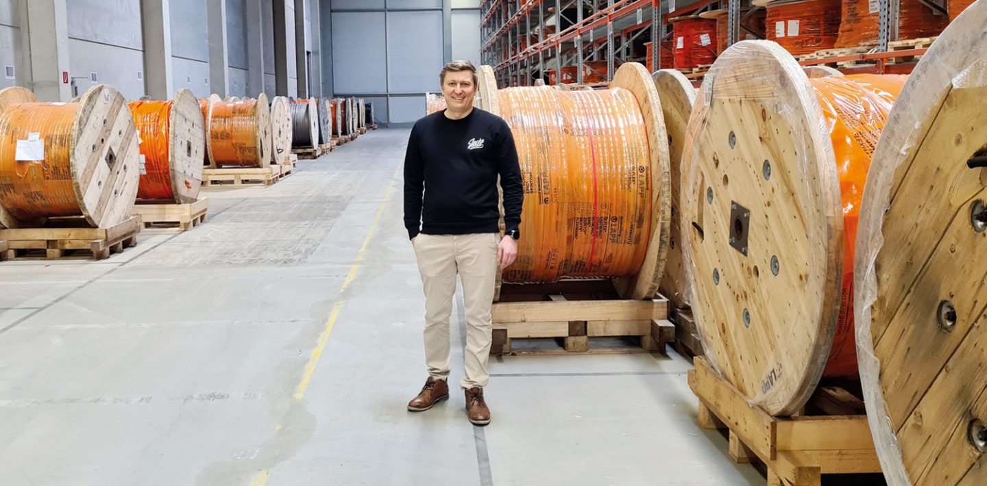 On the picture you can see Johann Zimmer in front of the cable drums by LAPP in the logistics and service center in Ludwigsburg.