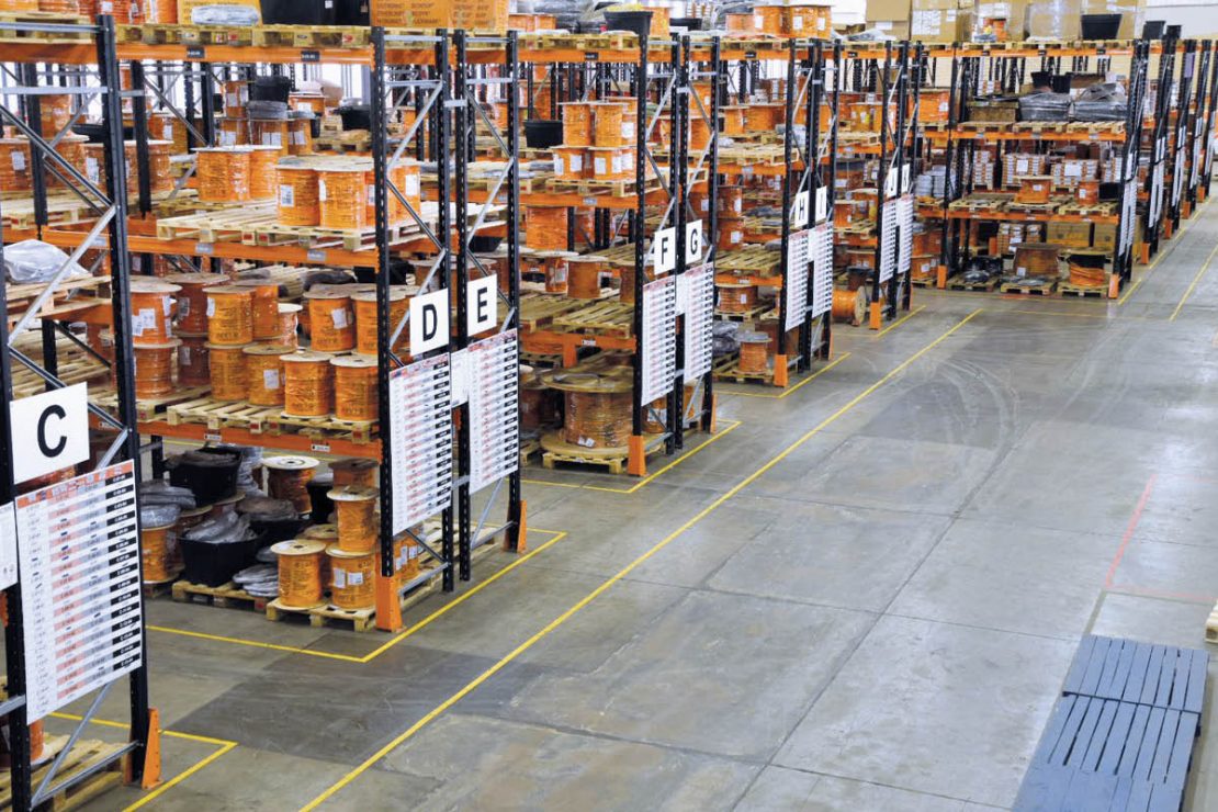 The picture shows the LAPP Southern Africa warehouse with many shelves full of cable drums and materials.