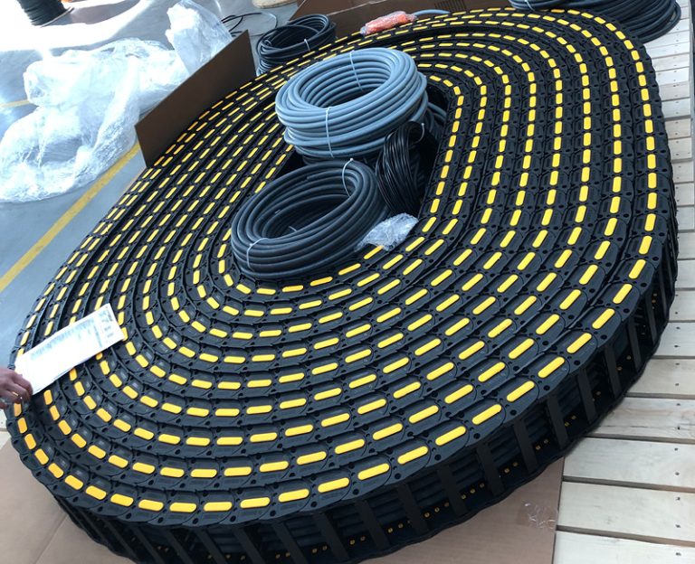 The picture shows a newly delivered drag chain from LAPP.